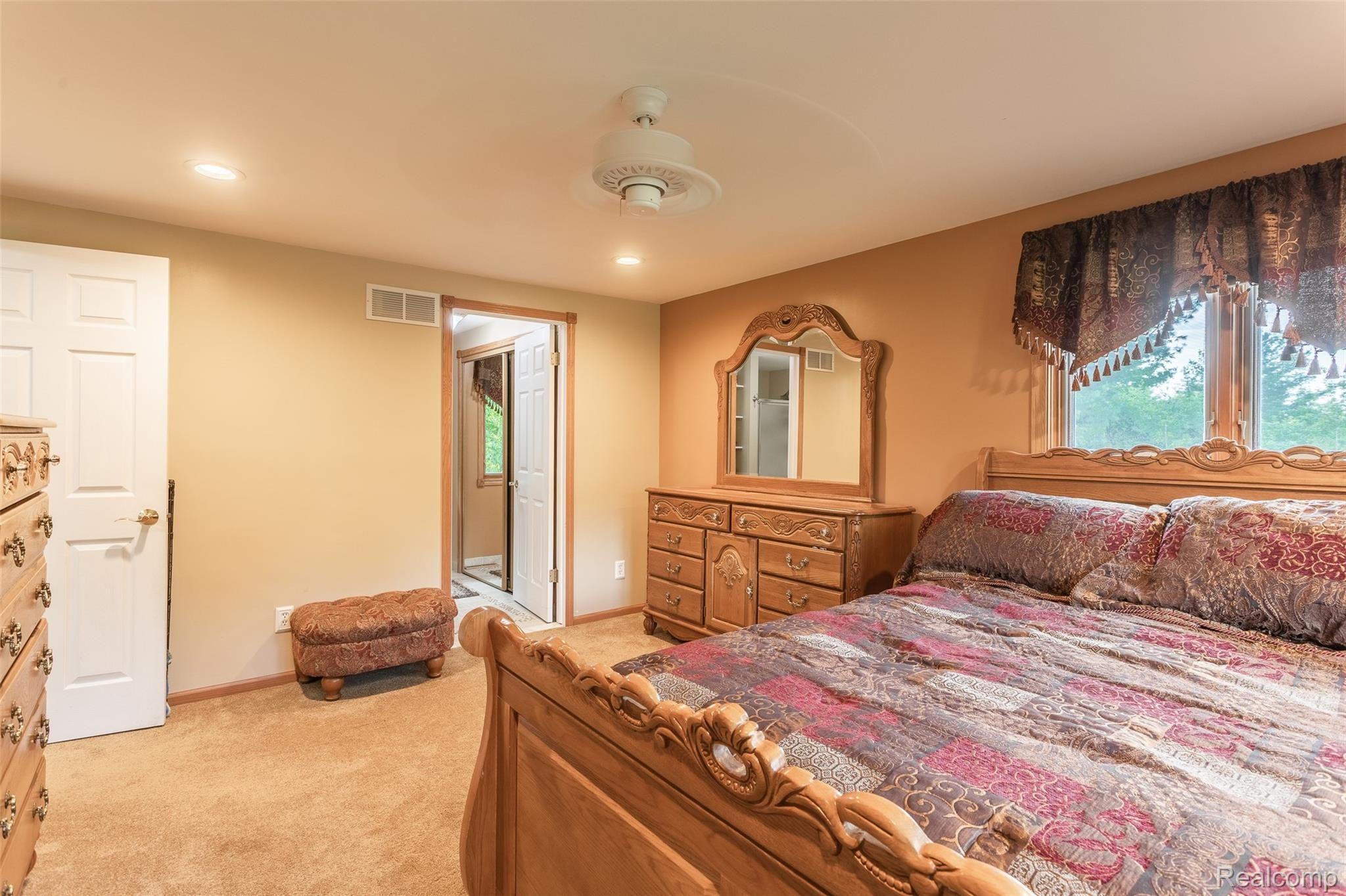 905 Gulley Road Howell, MI 48843 - Photo 23 of 52 Master bedroom suite