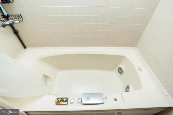 a bathroom with a bathtub