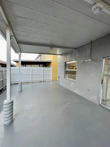 a view of a garage with furniture