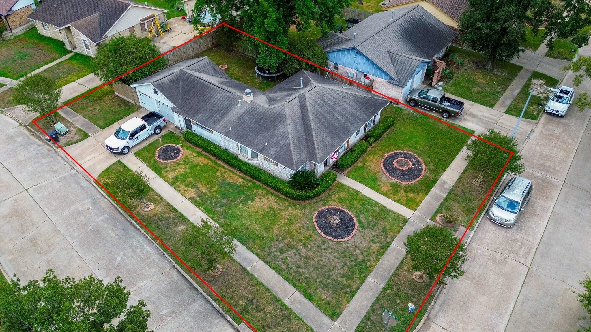 9014 Langfield Road Houston, TX 77040 - Photo 34 of 37 Aerial view highlighting the approximate property boundaries, spacious lot, landscaped grounds, and inviting outdoor areas. Property boundaries are approximate and should be independently verified by the buyer using a survey or other appropriate records.