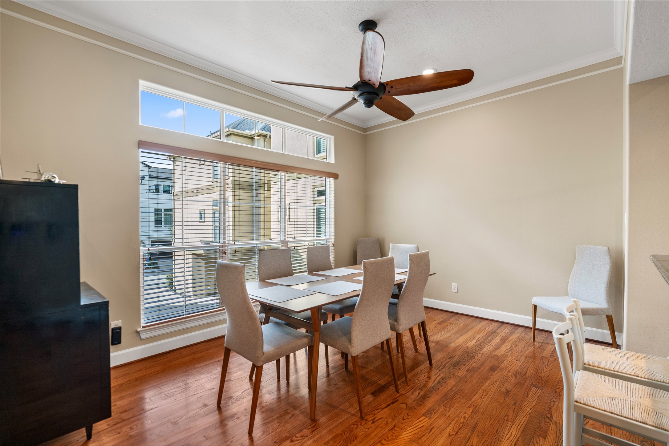 408 Fowler Street Houston, TX 77007 - Photo 13 of 24 Natural light fills the dedicated dining area just off the kitchen—perfect for both daily use and dinner parties.