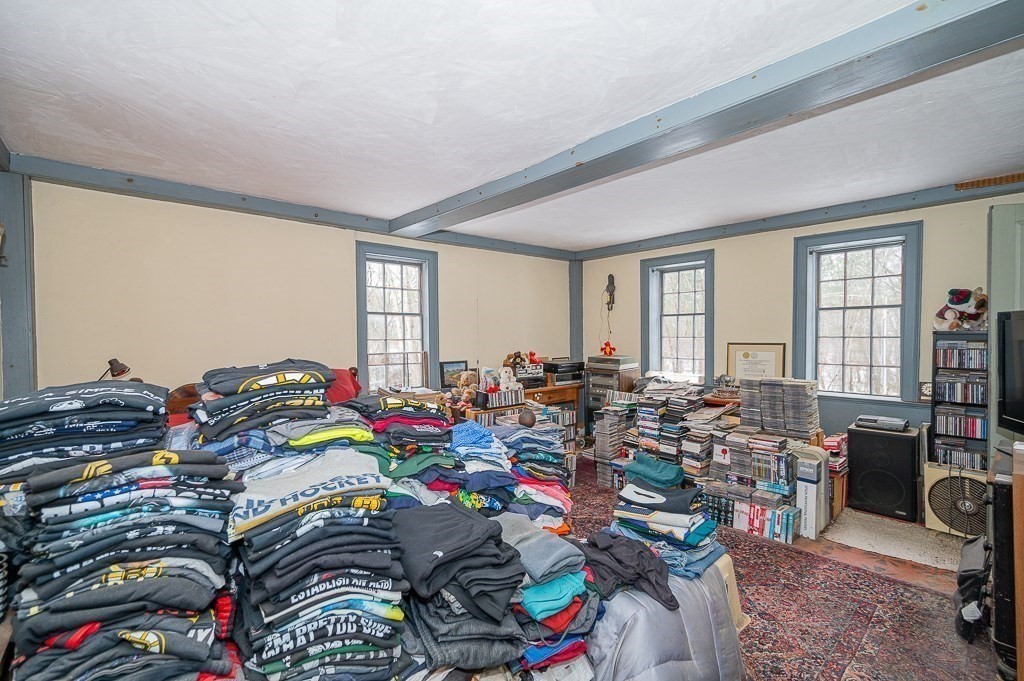 8 Old Common Road Sutton, MA 01590 - Photo 13 of 35 a bed room with a bed and a window