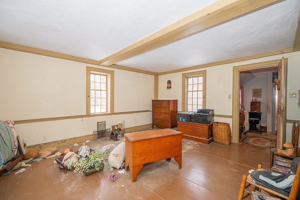 8 Old Common Road Sutton, MA 01590 - Photo 18 of 35 a living room with furniture and a window