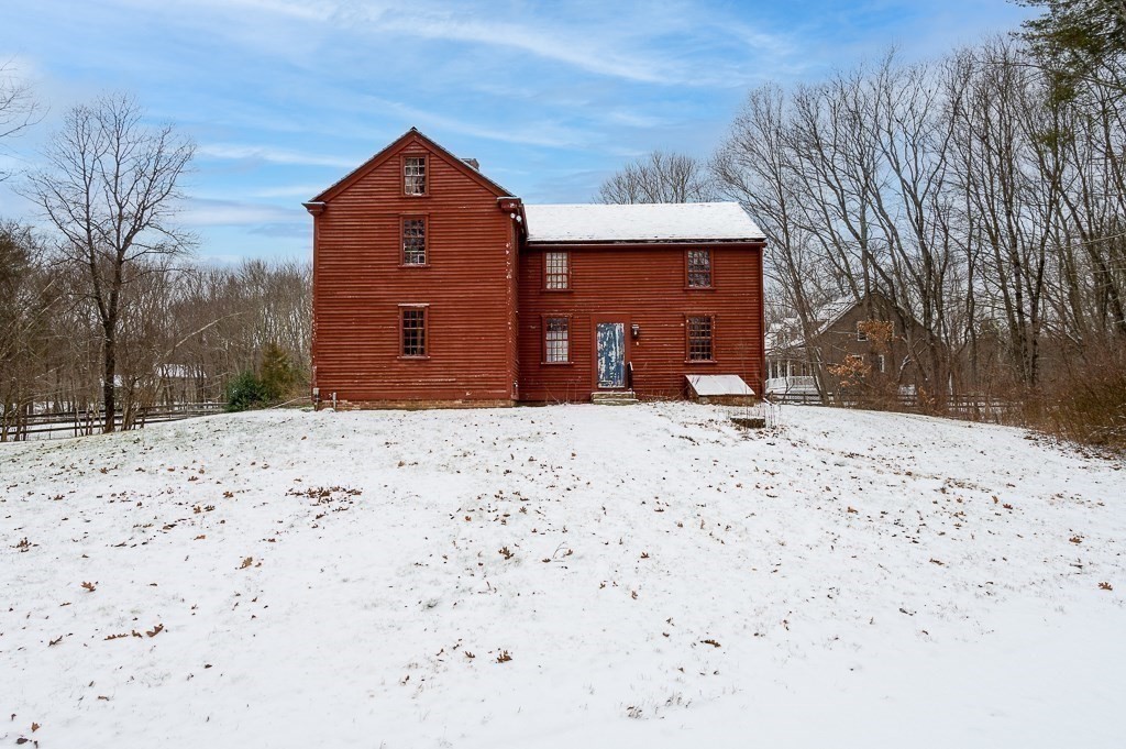 8 Old Common Road Sutton, MA 01590 - Photo 32 of 35 a front view of a house with a yard
