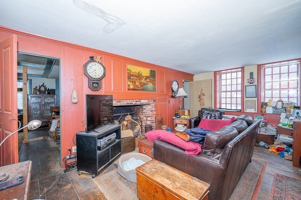 8 Old Common Road Sutton, MA 01590 - Photo 9 of 35 a living room with furniture and a window