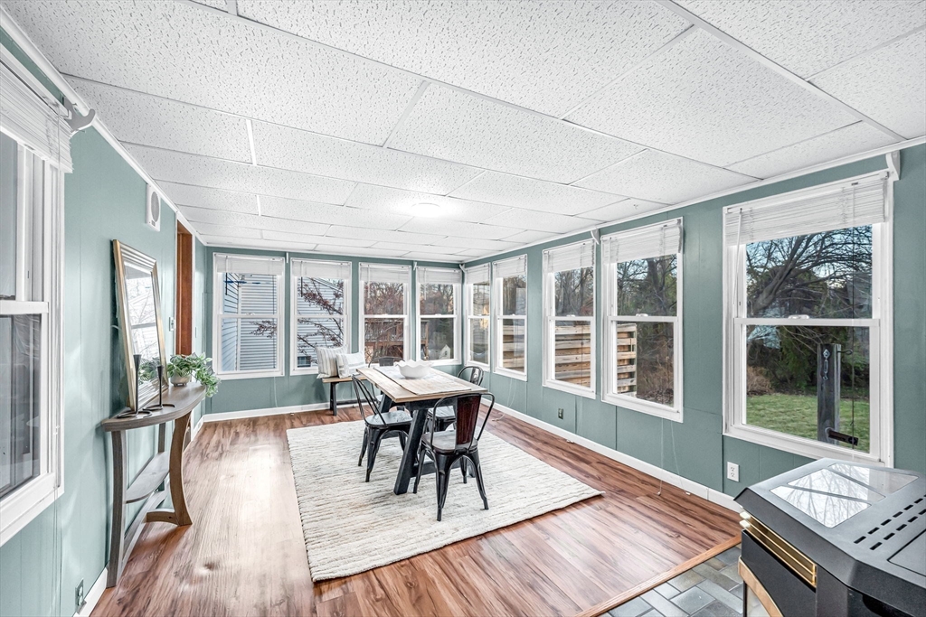 10 Kelsey Street East Longmeadow, MA 01028 - Photo 13 of 28 a view of a dining room with furniture large windows and wooden floor