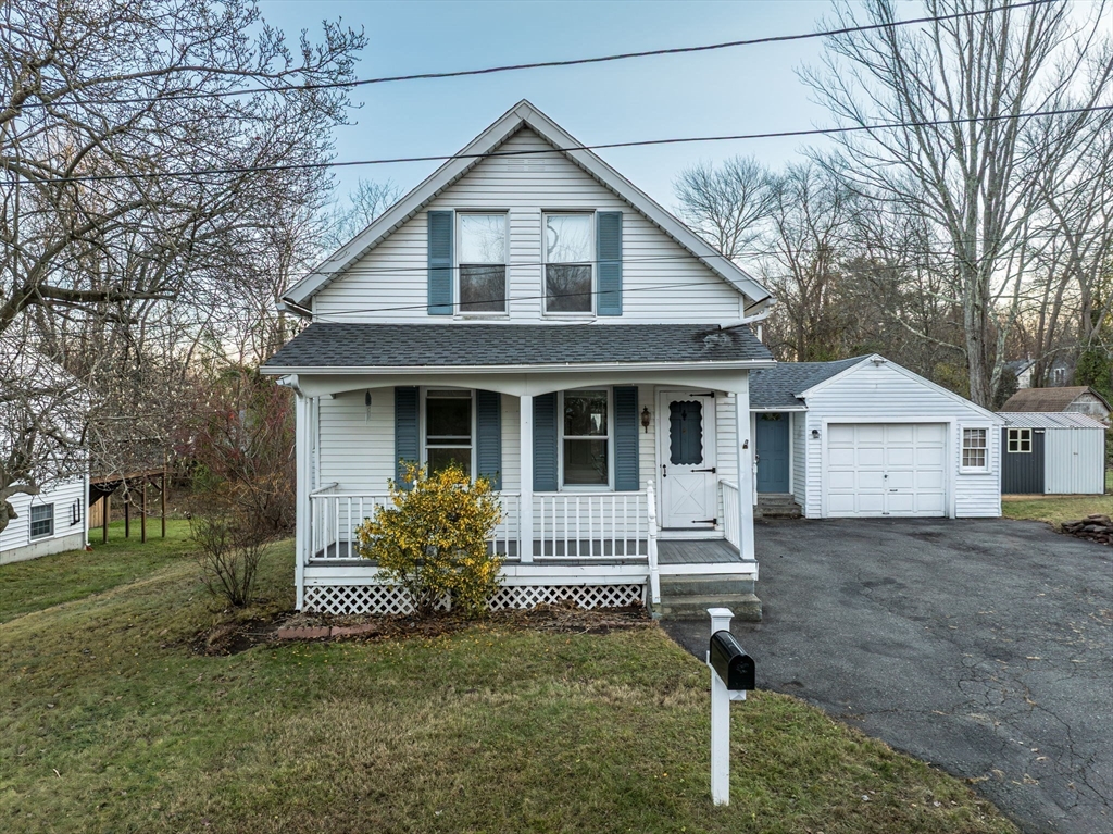 10 Kelsey Street East Longmeadow, MA 01028 - Photo 2 of 28 a view of a house with a yard and a large tree