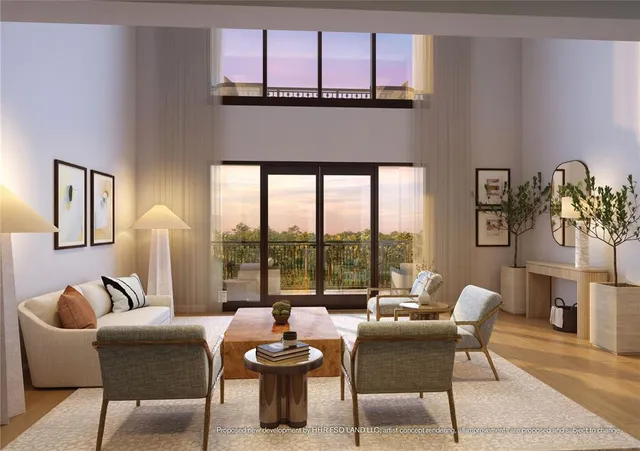 a living room with furniture and a floor to ceiling window