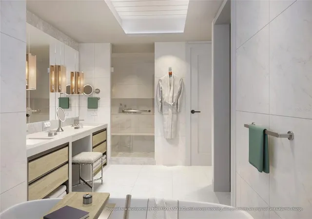 a bathroom with a tub sink and mirror