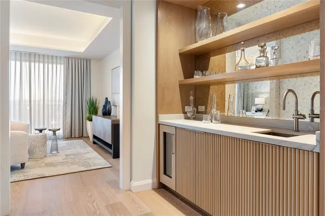 a kitchen with a sink and a window