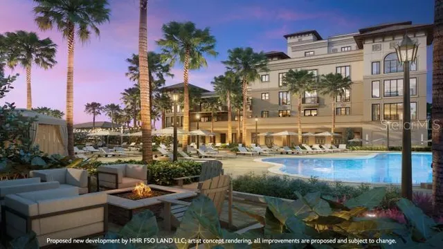 a view of a lake with couches and city view