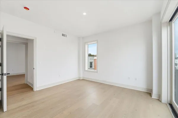 a view of a livingroom with furniture and window