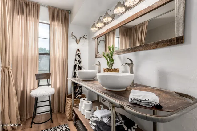 a living room with furniture and flat screen tv