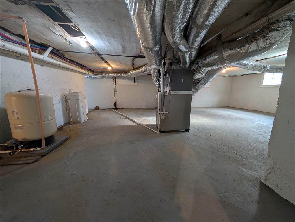 10796 Preble County Line Road Brookville, OH 45309 - Photo 27 of 33 This spacious basement offers ample potential for customization and additional living space.