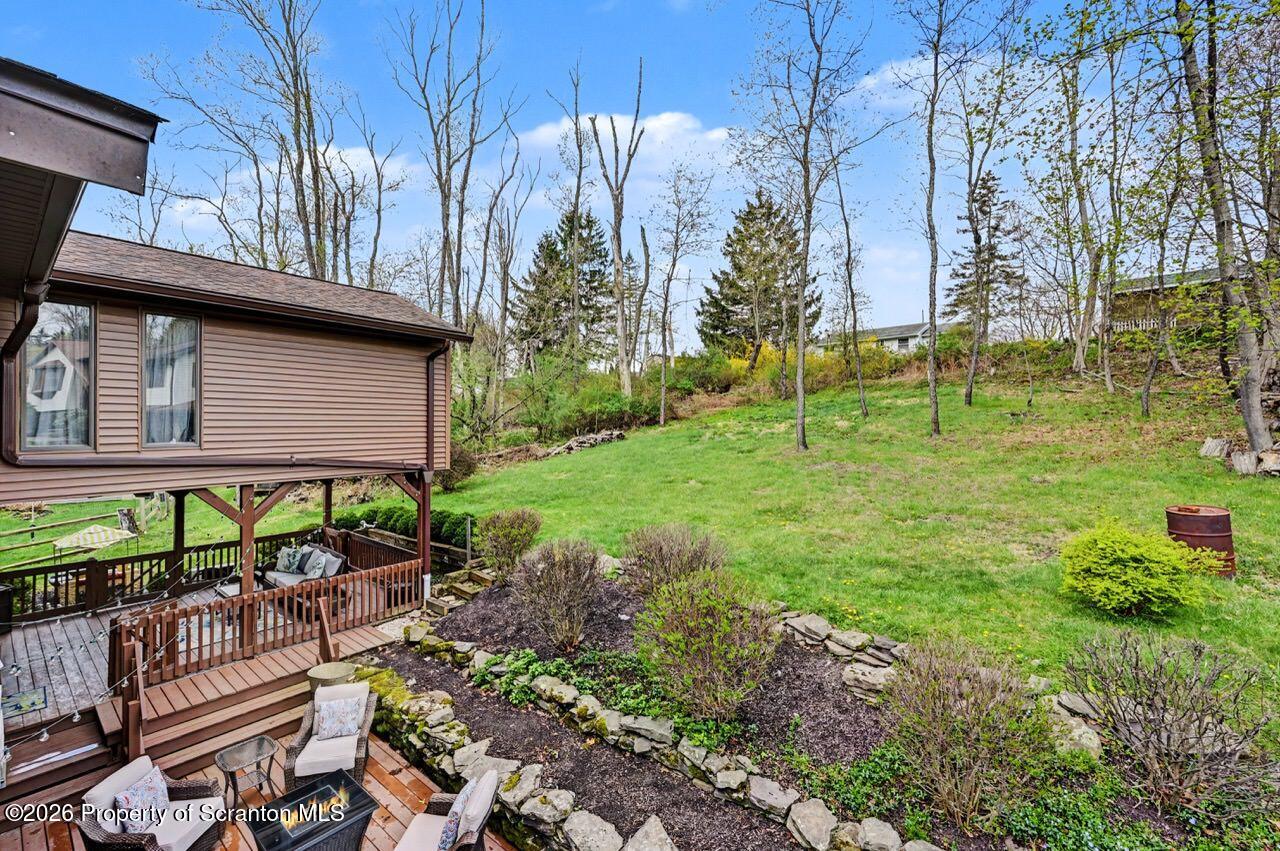 719 Scott Road Clarks Summit, PA 18411 - Photo 43 of 51 a backyard of a house with lots of green space
