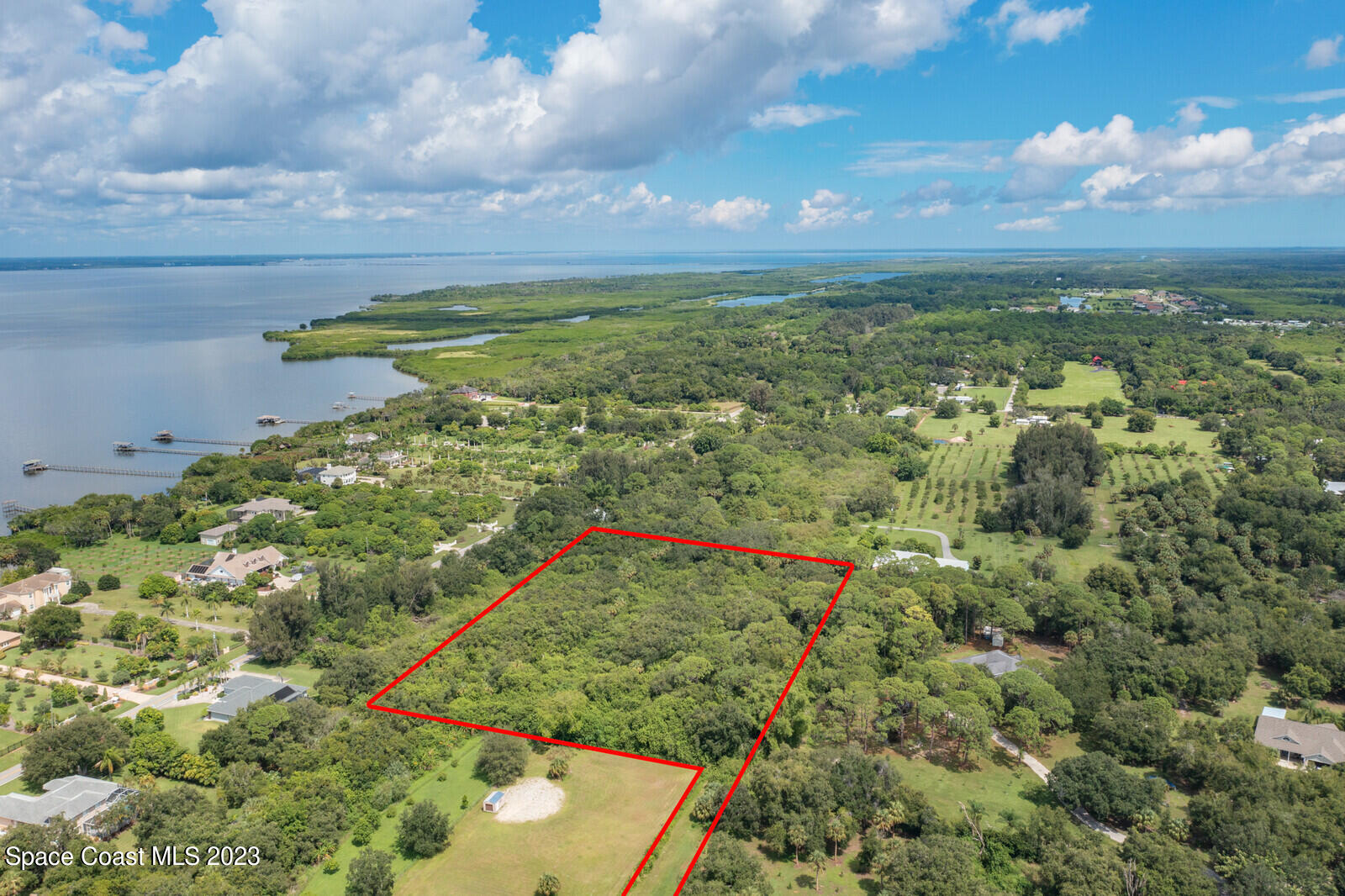 0 West Crisafulli Road Merritt Island, FL 32953 - Photo 1 of 11 a view of a yard with an umbrella