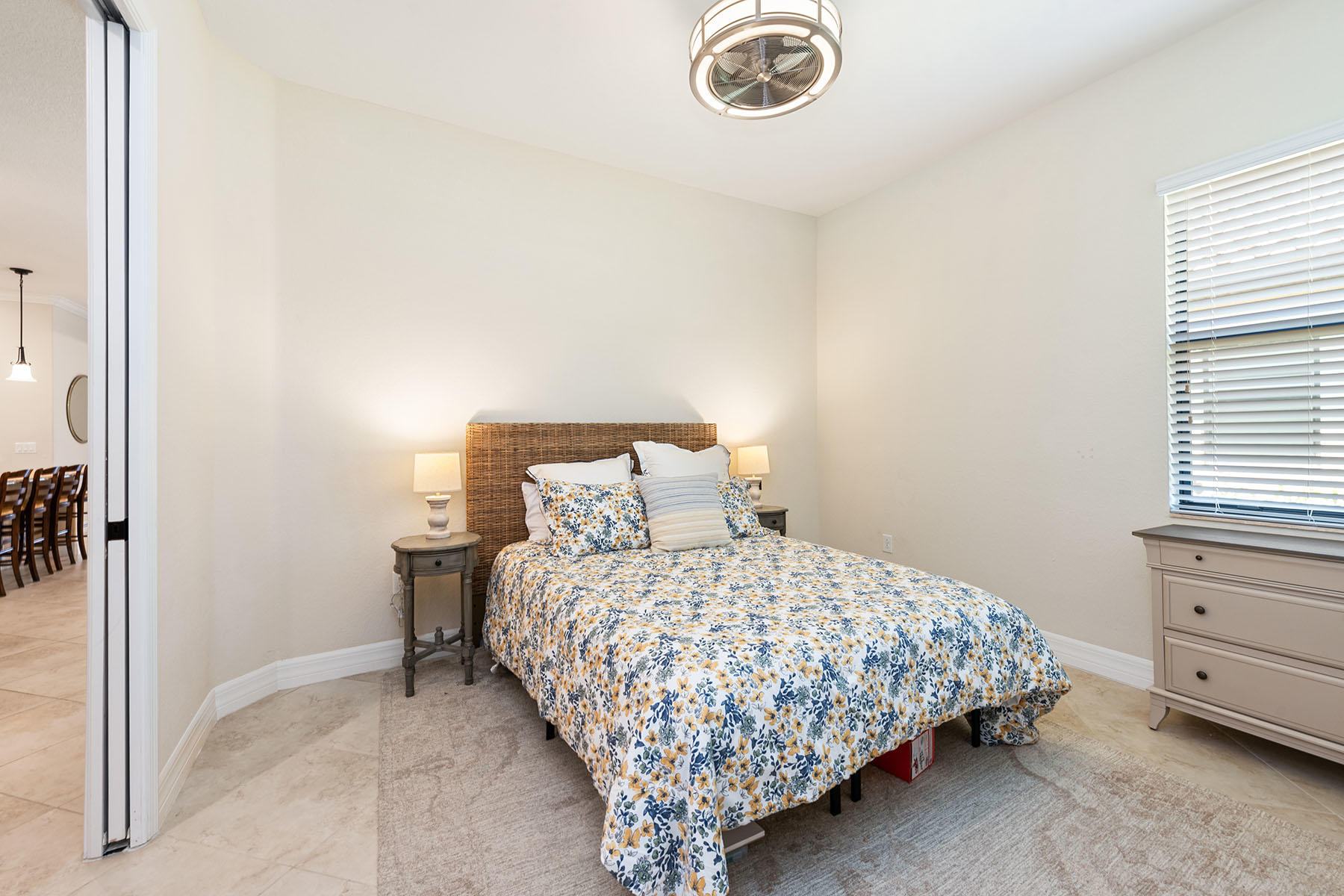 3009 Aviamar Circle Naples, FL 34114 - Photo 14 of 50 a bedroom with a bed and a window