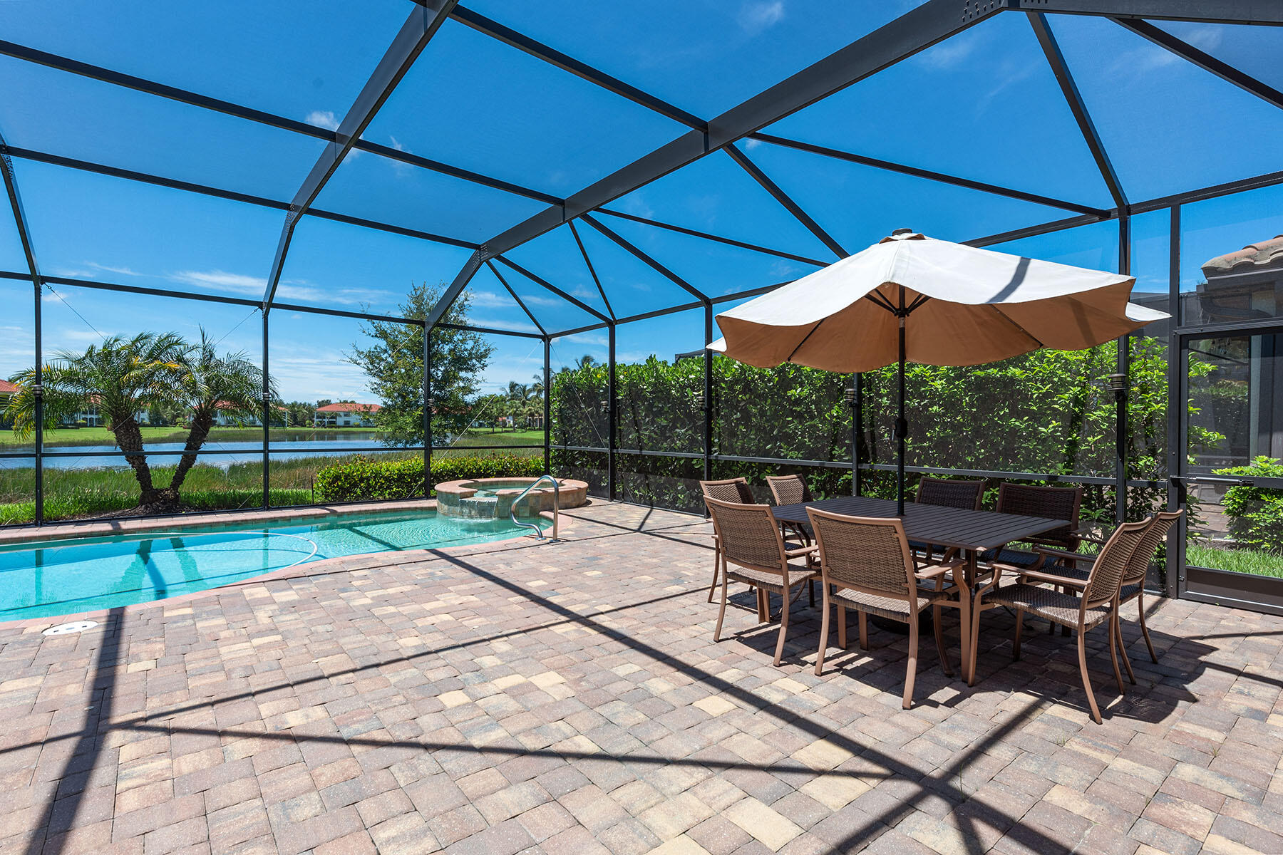 3009 Aviamar Circle Naples, FL 34114 - Photo 23 of 50 a view of a backyard with sitting area