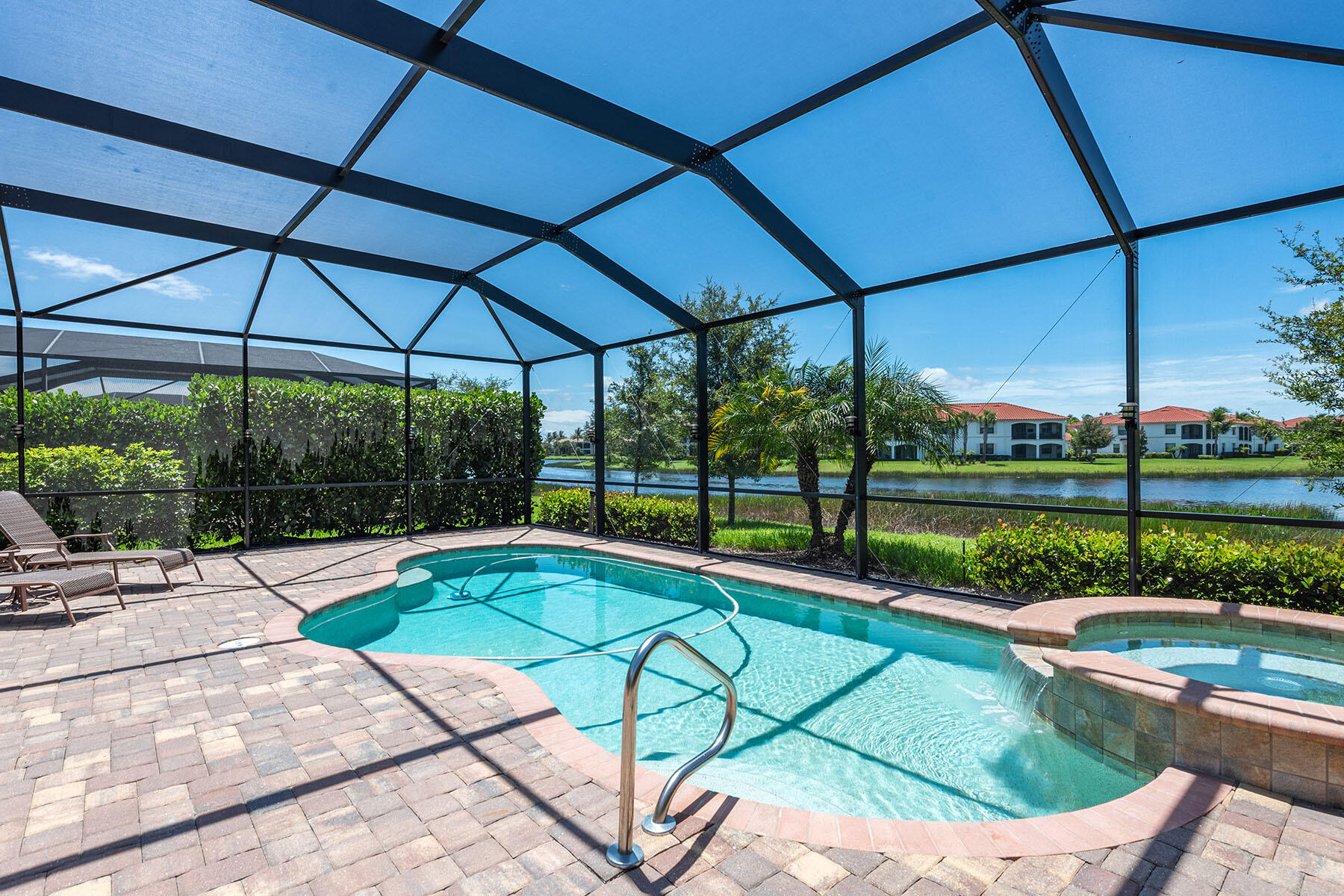 3009 Aviamar Circle Naples, FL 34114 - Photo 24 of 50 a view of a swimming pool with a porch