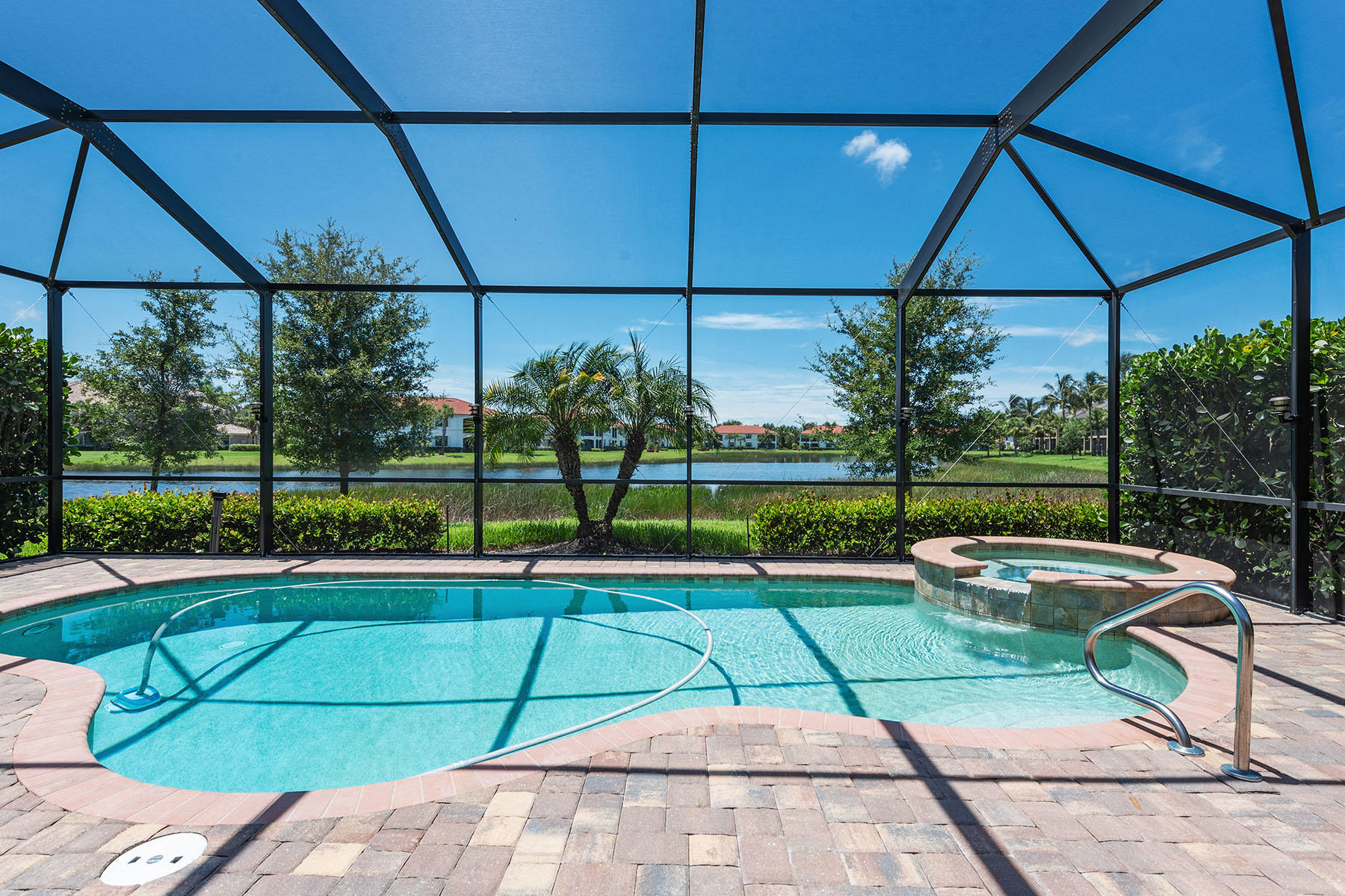 3009 Aviamar Circle Naples, FL 34114 - Photo 25 of 50 a view of a backyard and swimming pool
