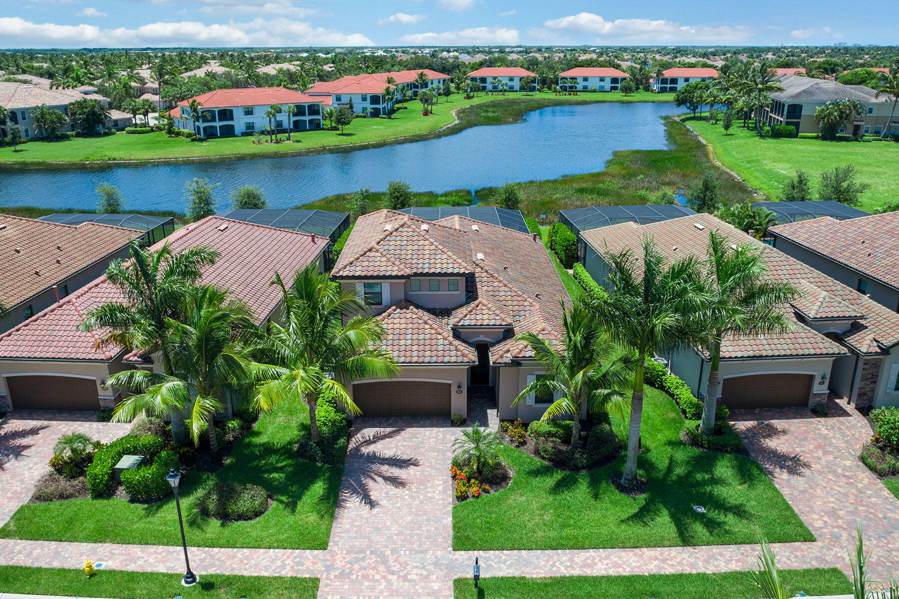 3009 Aviamar Circle Naples, FL 34114 - Photo 30 of 50 an aerial view of a house with a garden and trees