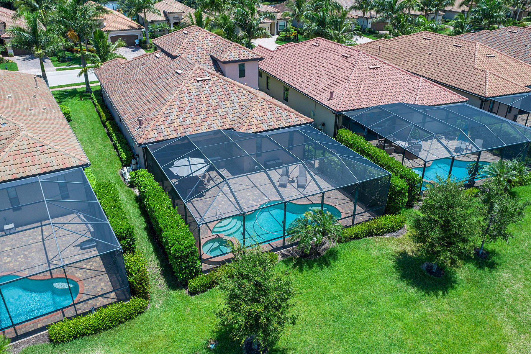 3009 Aviamar Circle Naples, FL 34114 - Photo 33 of 50 an aerial view of a house with a garden and plants