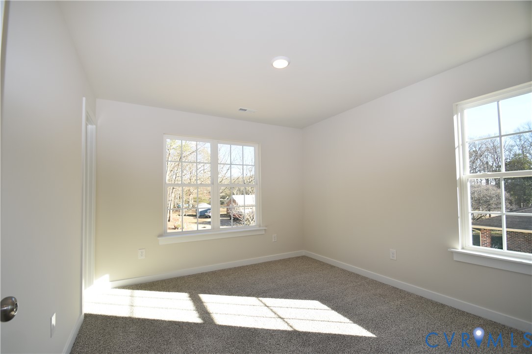 7014 Woodside Street Henrico, VA 23231 - Photo 13 of 13 an empty room with windows