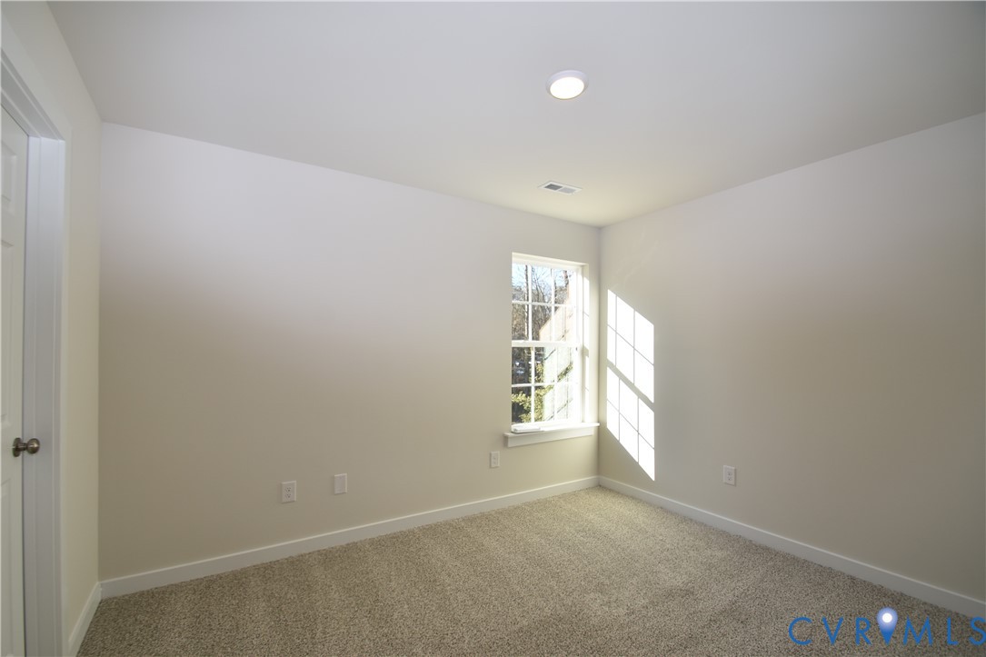 7014 Woodside Street Henrico, VA 23231 - Photo 10 of 13 a view of an empty room and a window