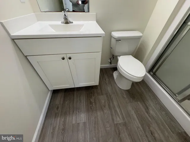 a bathroom with a sink and a toilet