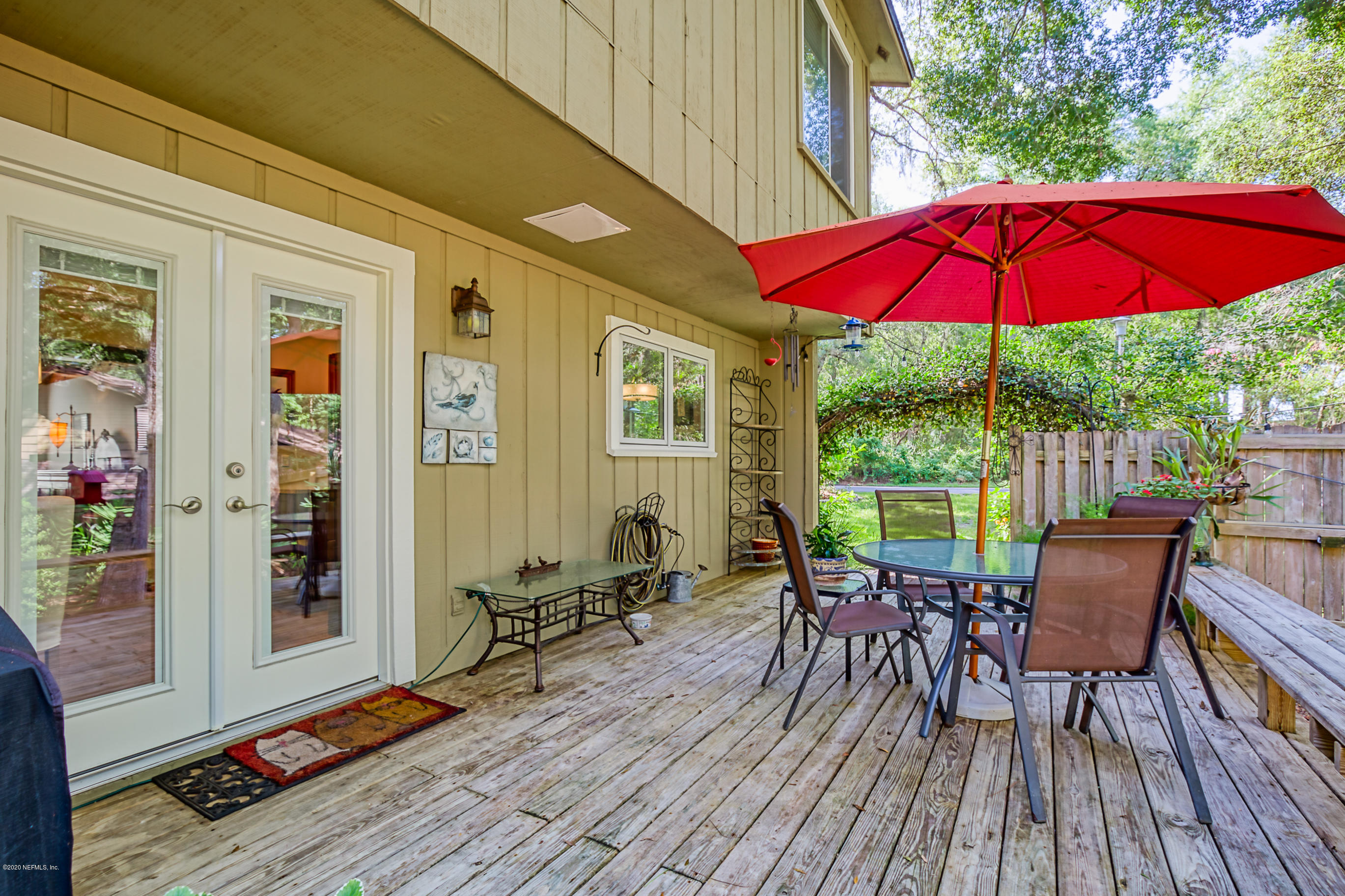 502 Raintree Trail St. Augustine, FL 32086 - Photo 5 of 69 wood deck off of kitchen