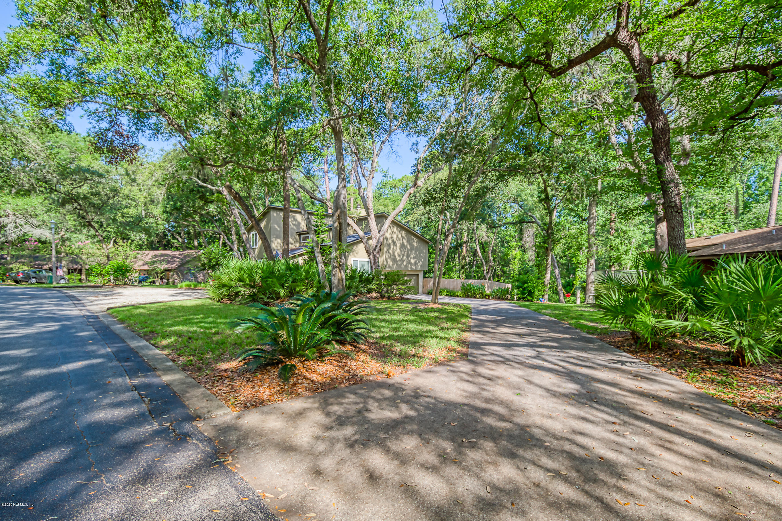 502 Raintree Trail St. Augustine, FL 32086 - Photo 63 of 69 coming up to the home