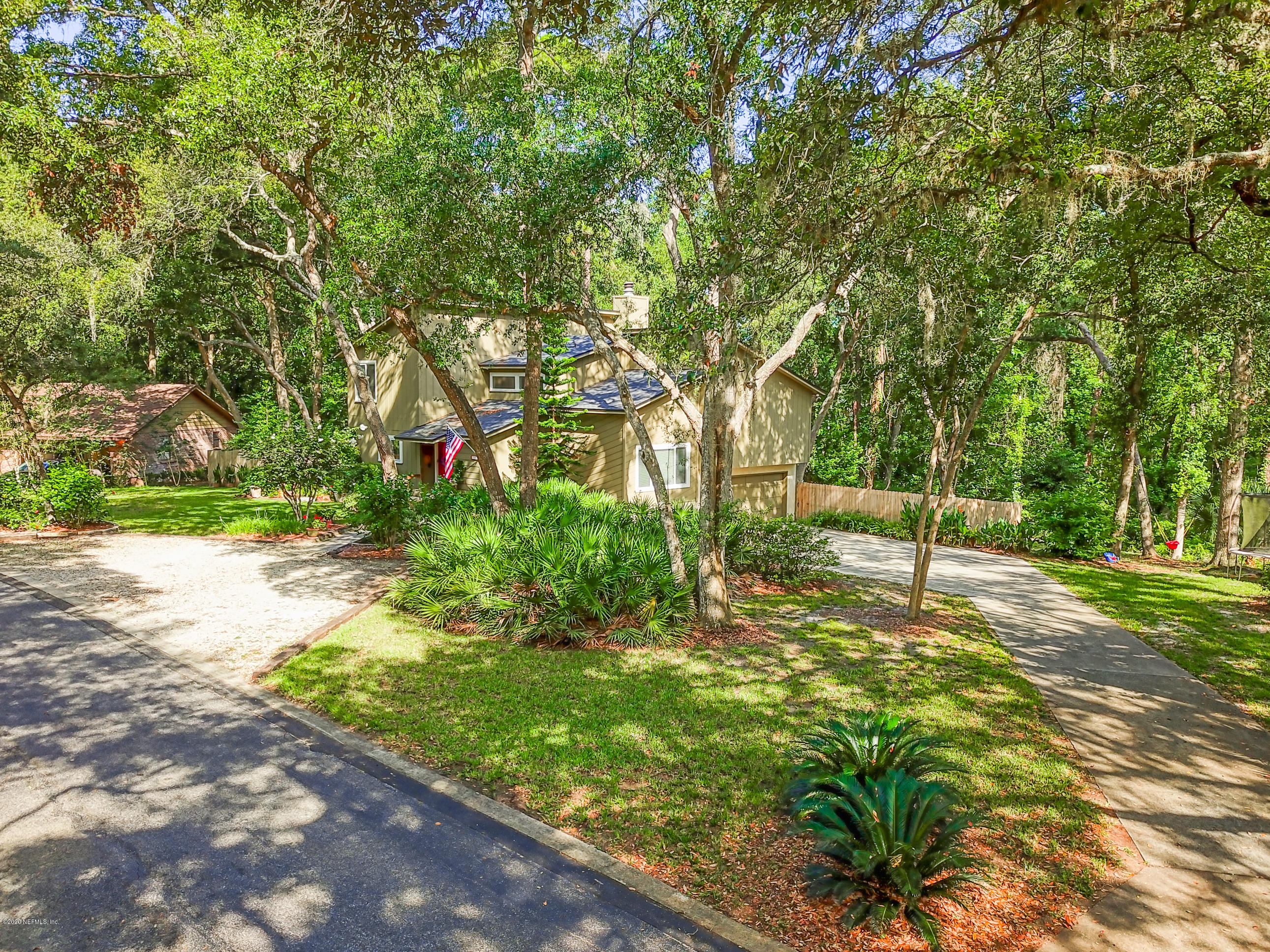 502 Raintree Trail St. Augustine, FL 32086 - Photo 64 of 69 coming up to the home
