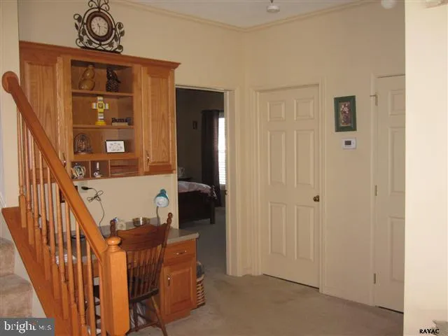 a view of an entryway with a door