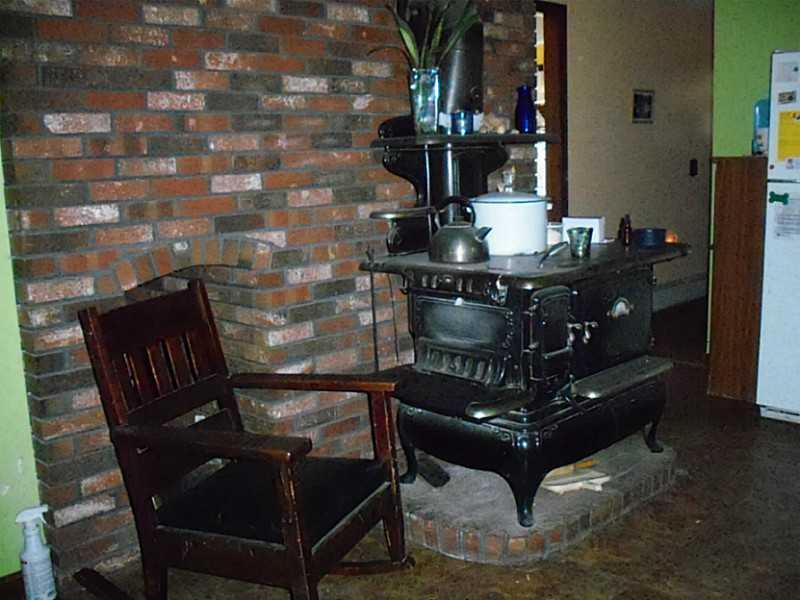784 Lawrence Road Pownal, ME 04069 - Photo 8 of 13 Kitchen. Antique cook stove
