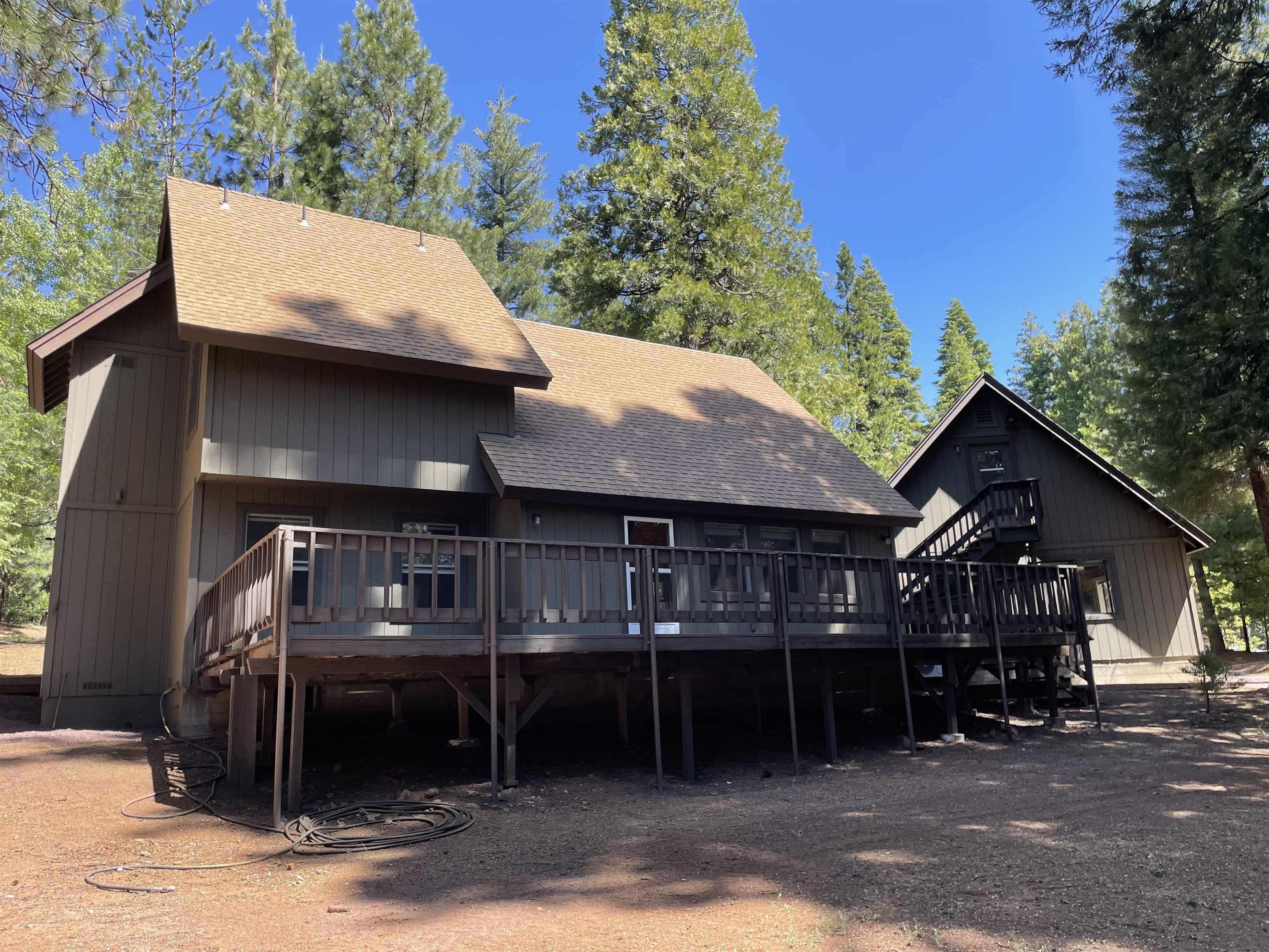 603 East Burnt Cedar Road Lake Almanor, CA 96137 - Photo 32 of 33 a front view of a house with garden