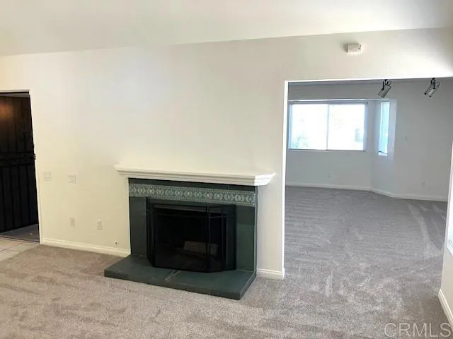 a living room with a fireplace