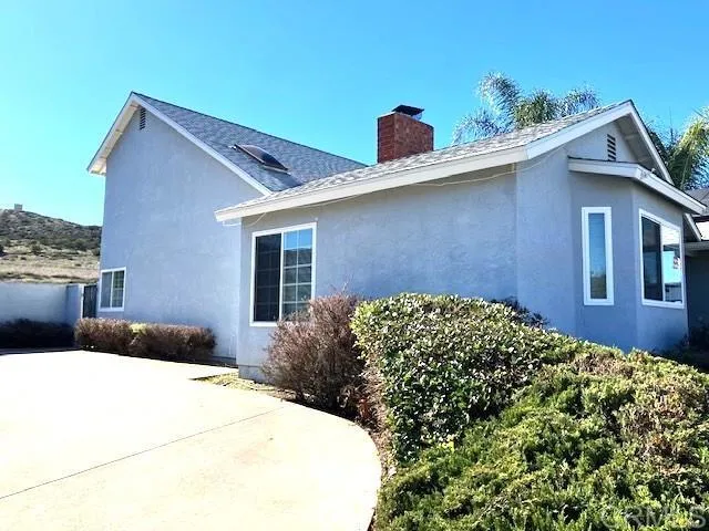 a house view with a outdoor space