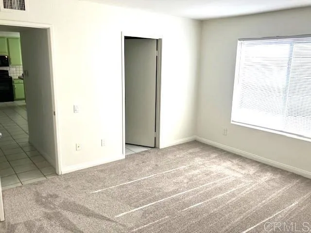 a view of a room that has a window