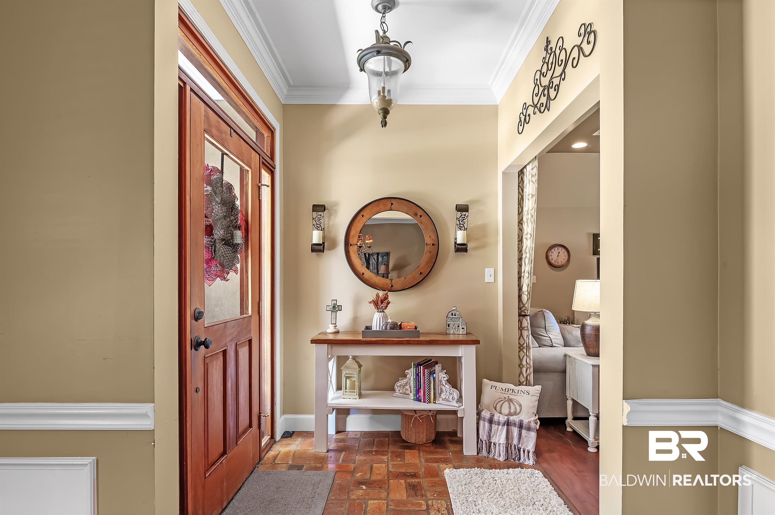 9901 Glover Court Fairhope, AL 36532 - Photo 3 of 52 Foyer entrance featuring crown molding