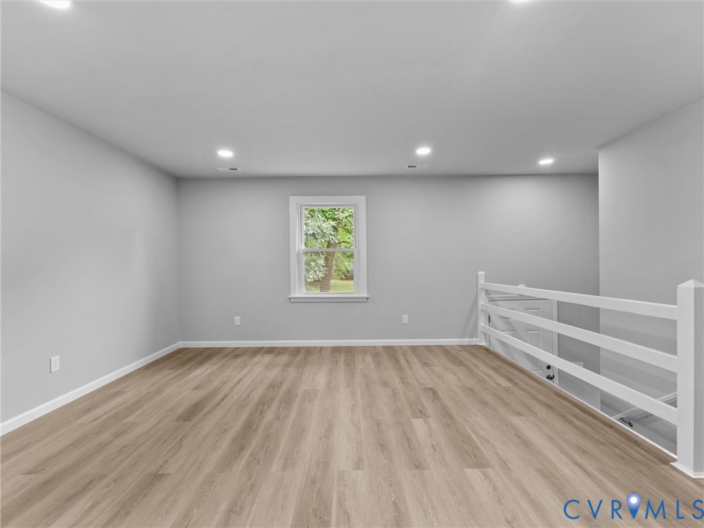 6204 Walderbrook Road Richmond, VA 23234 - Photo 7 of 32 Spacious room featuring wood-finish flooring, rece