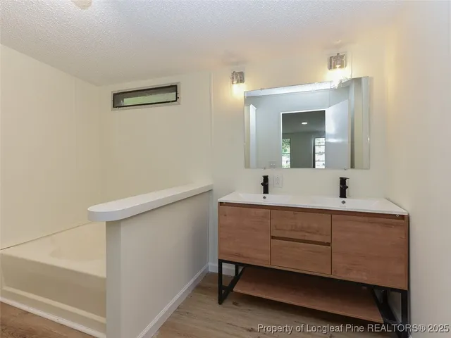 a view of a backyard with trees