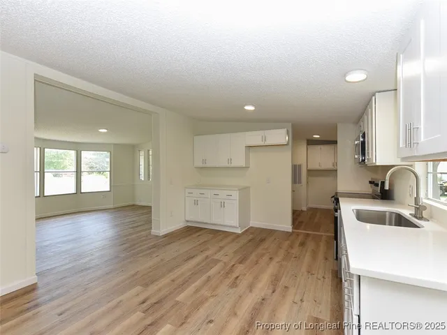 a view of small space with wooden floor