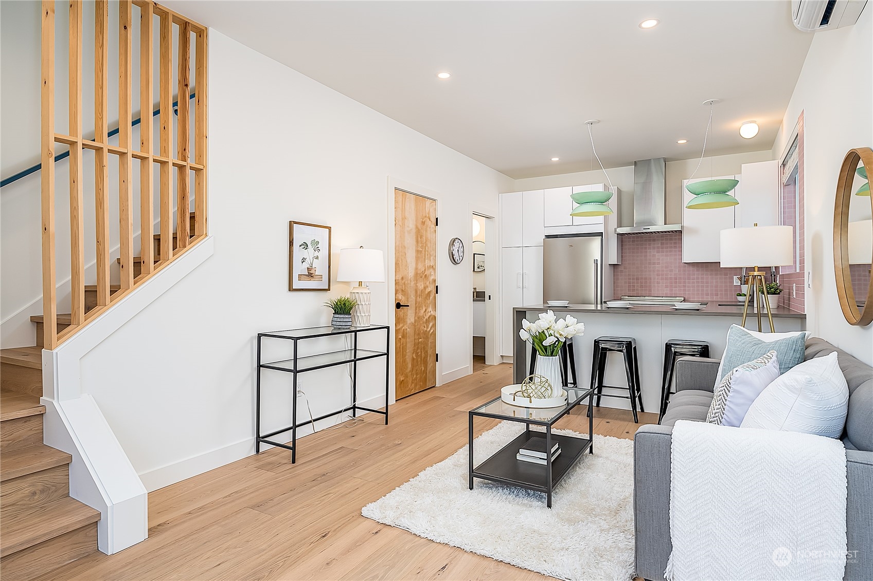 916 North 100th Street, Unit B Seattle, WA 98133 - Photo 1 of 19 a living room with furniture and a table