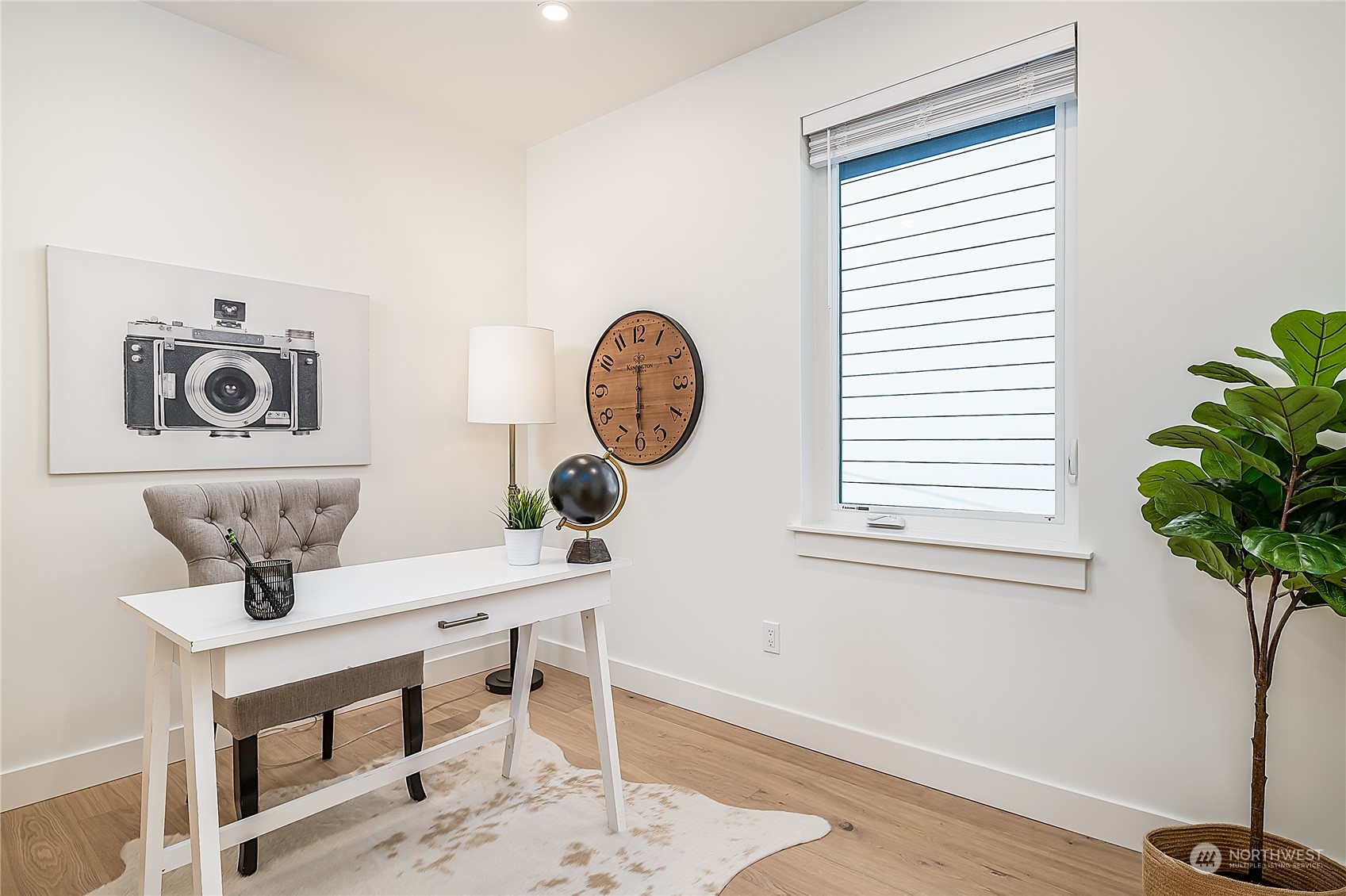 916 North 100th Street, Unit B Seattle, WA 98133 - Photo 12 of 19 a view of a room with a window and wooden floor