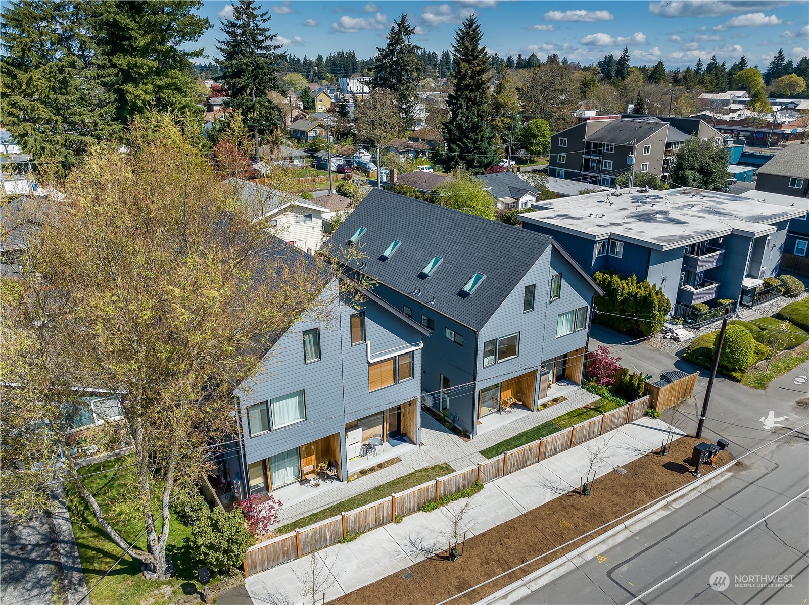 916 North 100th Street, Unit B Seattle, WA 98133 - Photo 17 of 19 an aerial view of a house with a garden