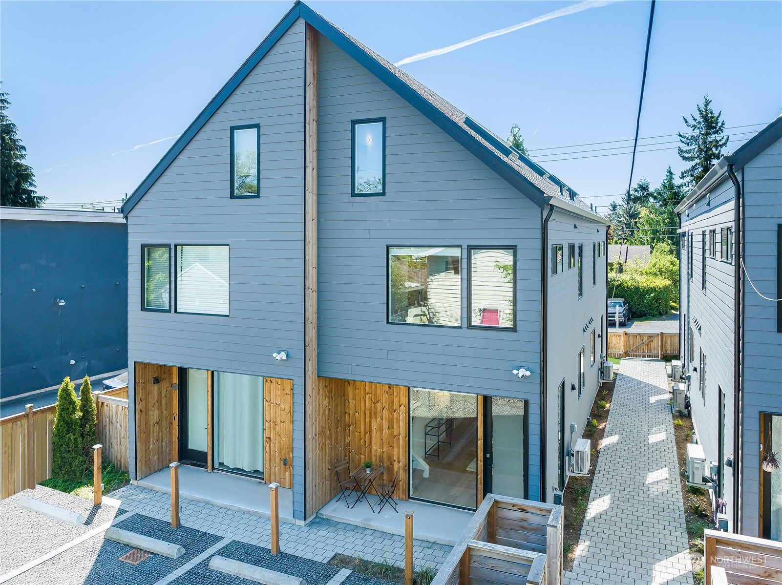 916 North 100th Street, Unit B Seattle, WA 98133 - Photo 3 of 19 a front view of a house with garden