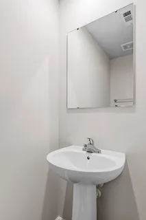 a sink with a mirror