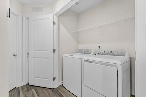 a utility room with dryer and washer