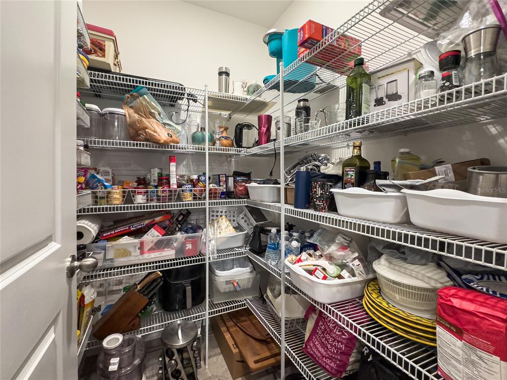 5127 Sable Chime Drive Wimauma, FL 33598 - Photo 12 of 56 a store with an outdoor seating