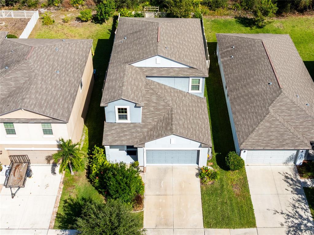 5127 Sable Chime Drive Wimauma, FL 33598 - Photo 43 of 56 an aerial view of a house with a yard